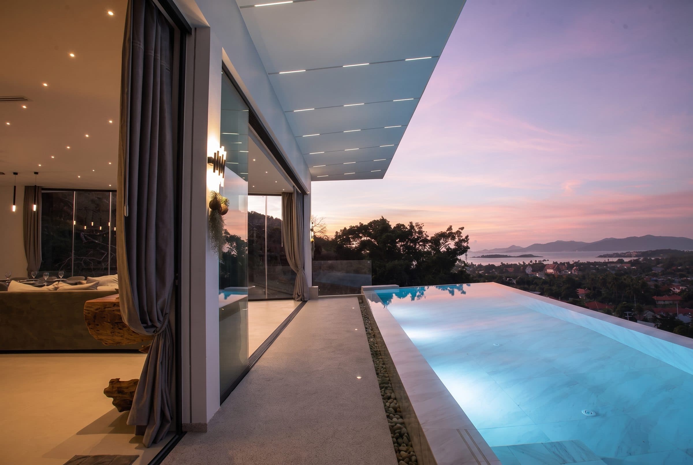 Infinity pool along the terrace at sunset