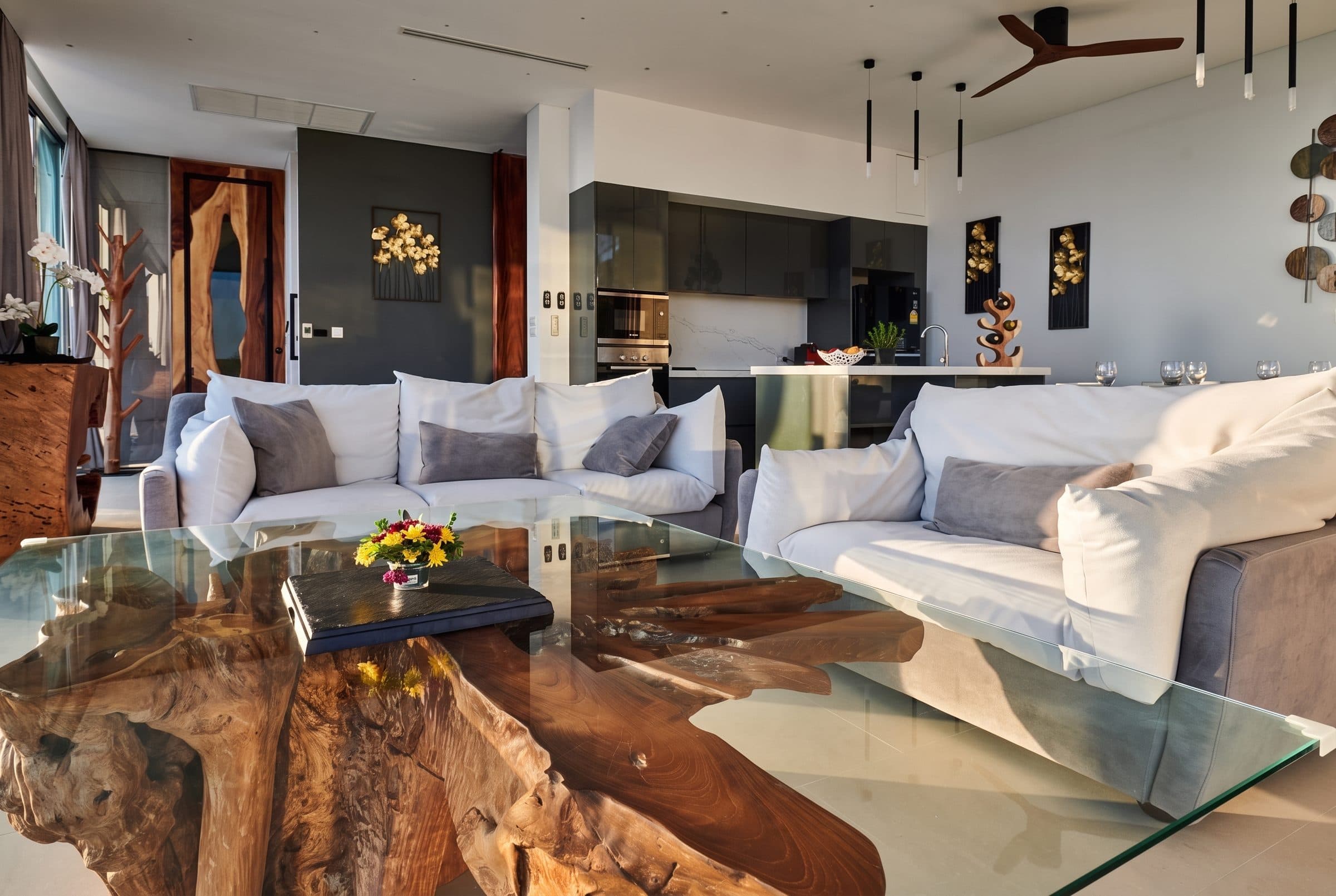 Living room with root-wood and glass coffee table