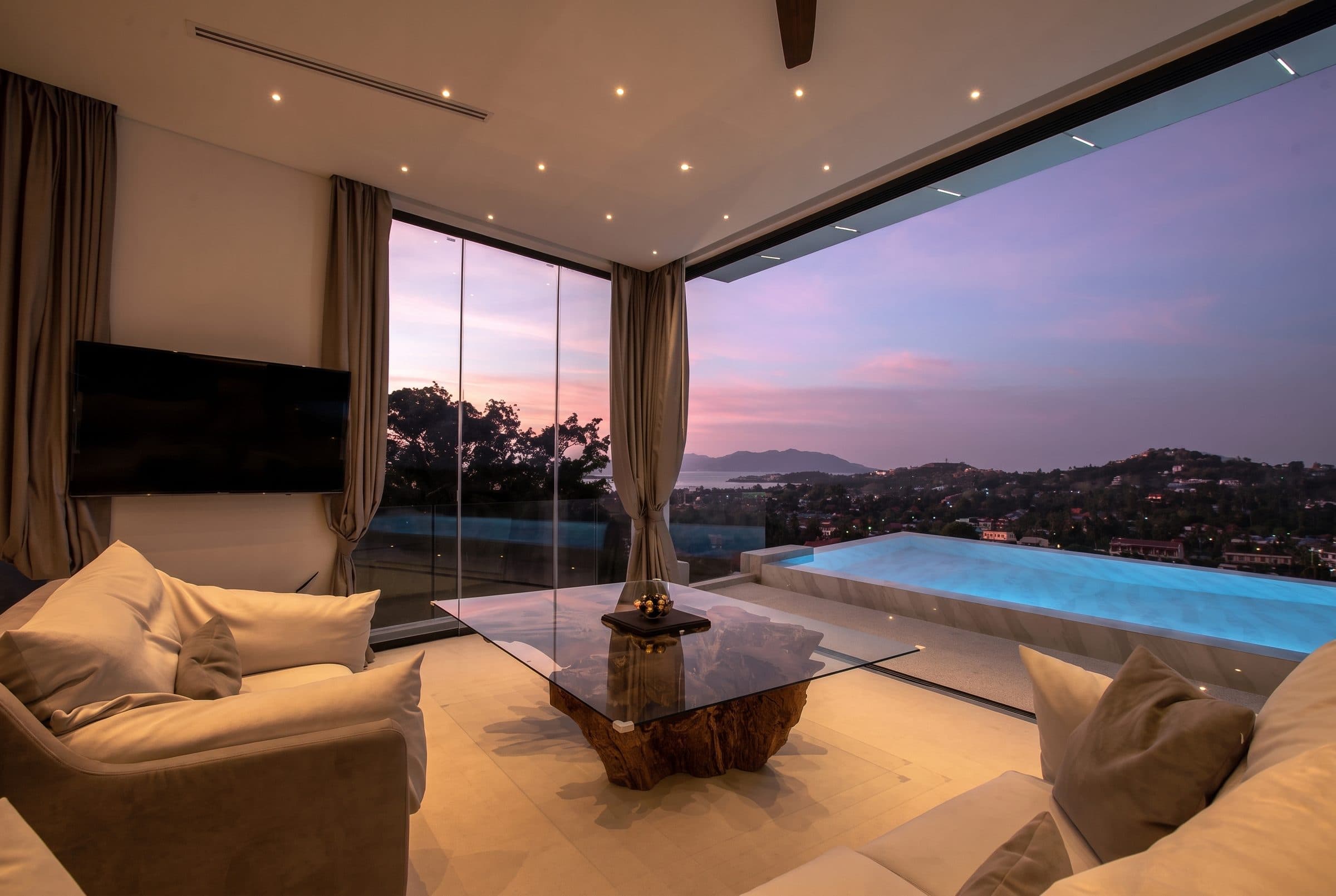 Lounge at sunset facing the pool and sea