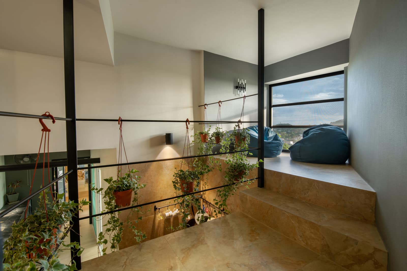 Mezzanine nook with beanbags and hanging garden