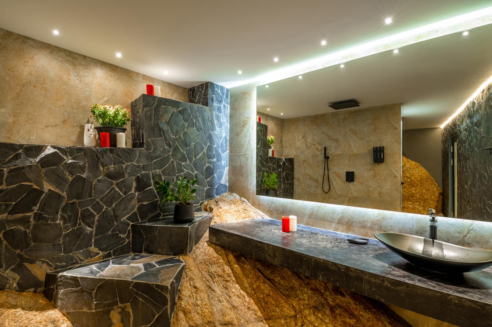 Natural-rock bathroom built into the mountain stone