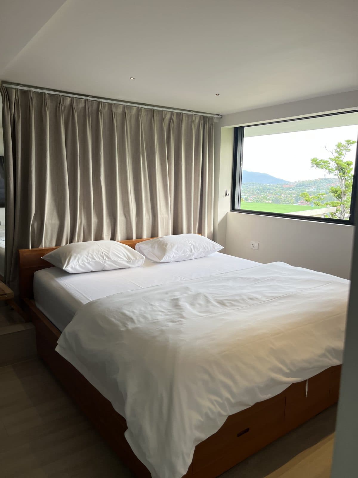 King bed beside the sea-view window