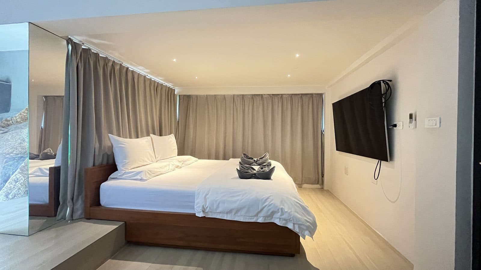Bedroom with king bed and TV