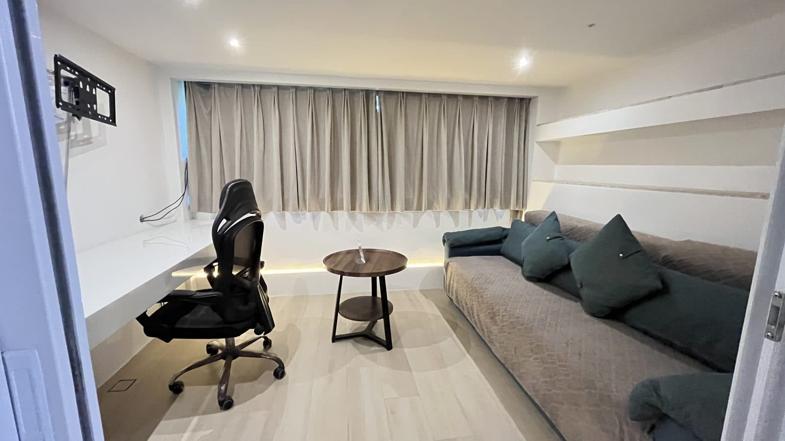 Office chair, coffee table and sofa bed