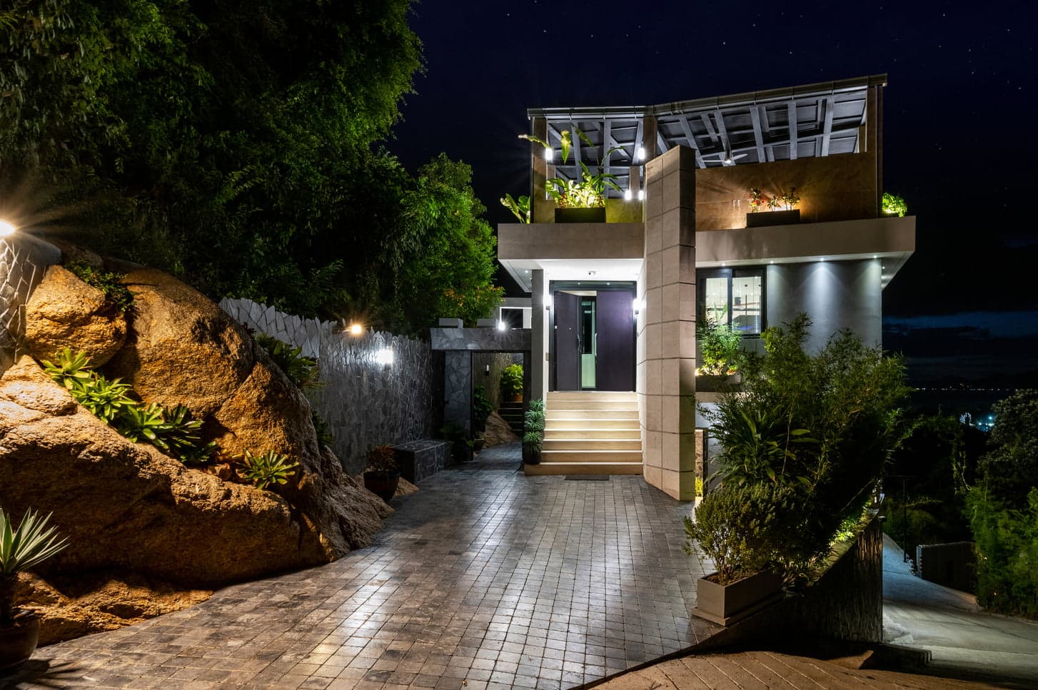 Tuxedo villa entrance at night
