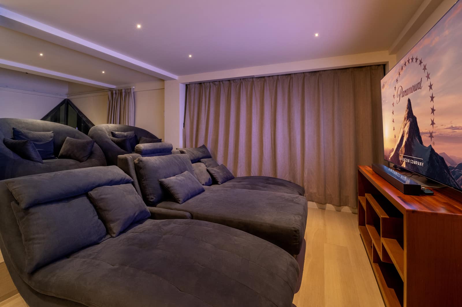 Tuxedo villa cinema lounge with recliner beds