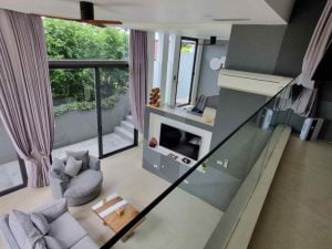 Spacious two-level Garden Suite with a stylish living area and large windows.