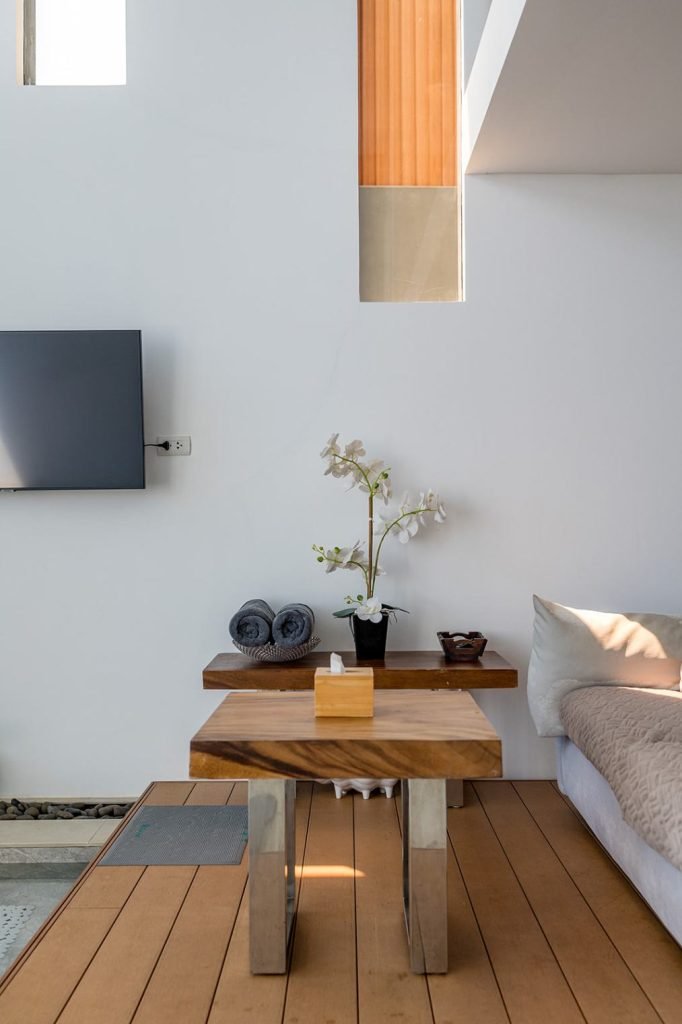 Elegant and minimalist living room in Magic Suites.
