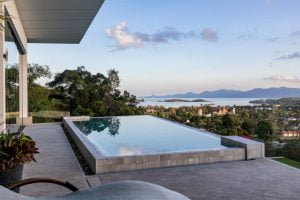 Alternate view from the Honeymoon Suite pool during evening, with the rest of the island in the backdrop.
