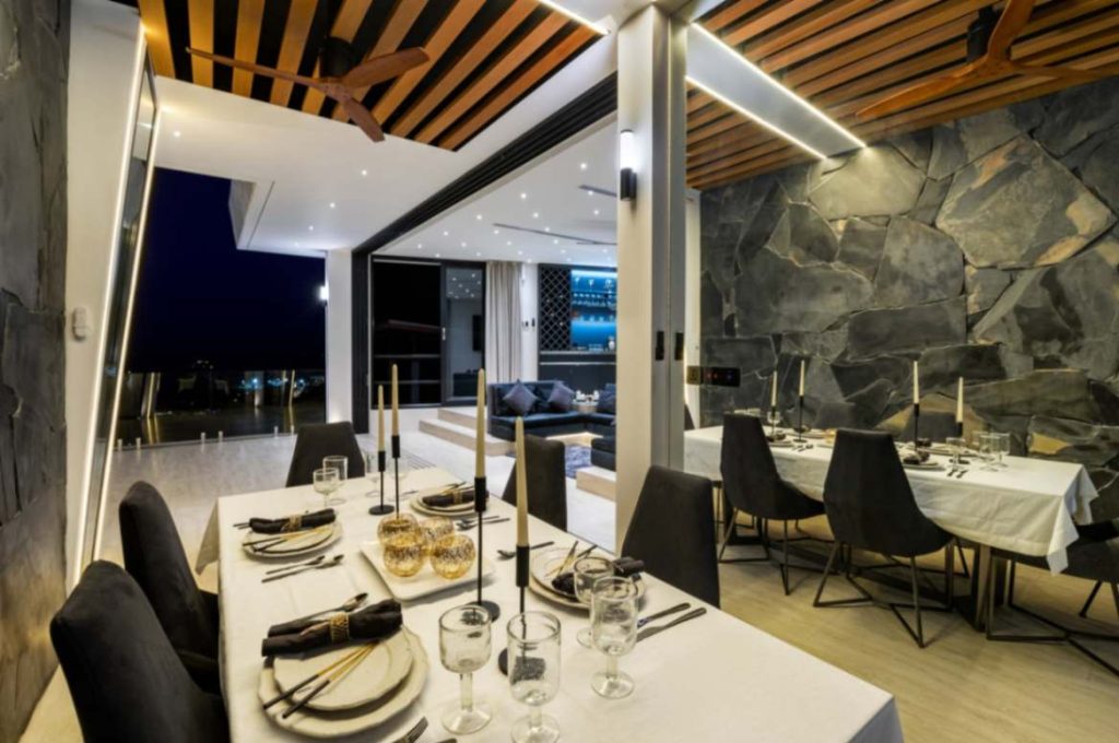 Romantic dining area in the elegantly-designed Tuxedo villa.
